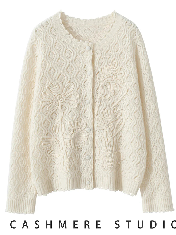 Draping of the women's Embossed Lace Cashmere Cardigan in Pearl Bush, showcasing its soft, flowing cashmere and delicate lace texture, Borcelleclothes.