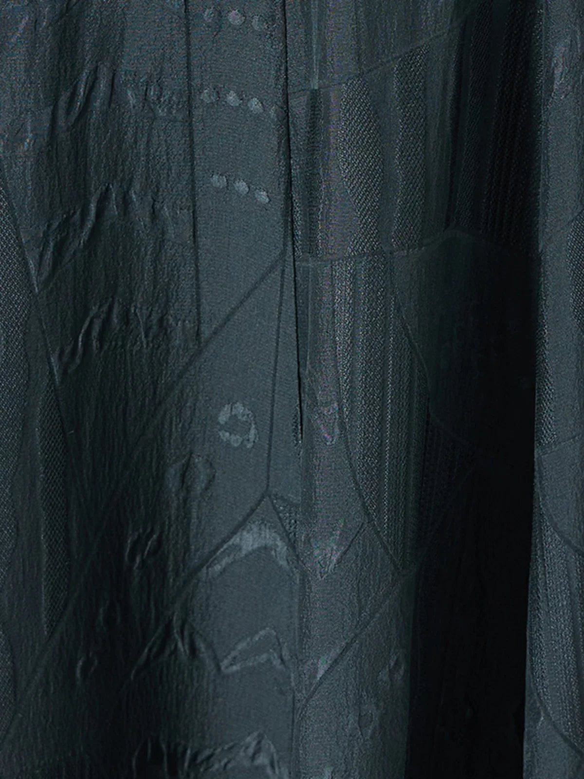 Close-up of the embroidered jacquard silk fabric in Outer Space color. From Borcelleclothes.