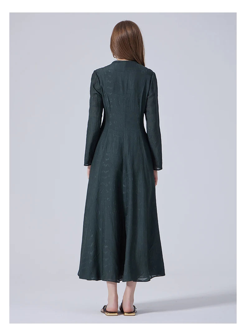 Back view of the dress showing full silhouette and detailed seams. From Borcelleclothes.