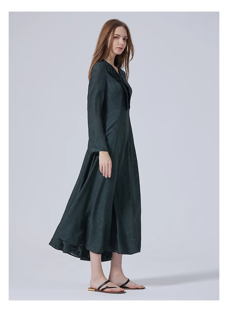 Side view of the flared silk dress in Outer Space color. From Borcelleclothes.