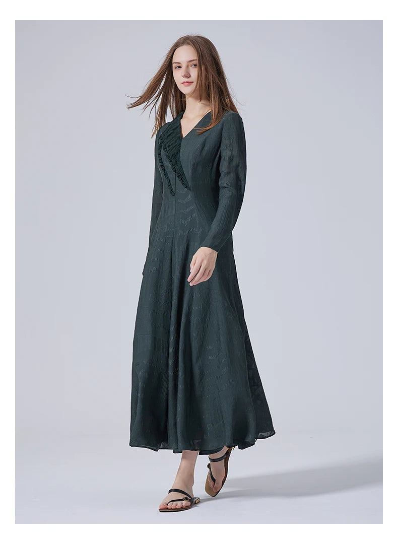 Model walking in profile in the Outer Space silk dress. From Borcelleclothes.