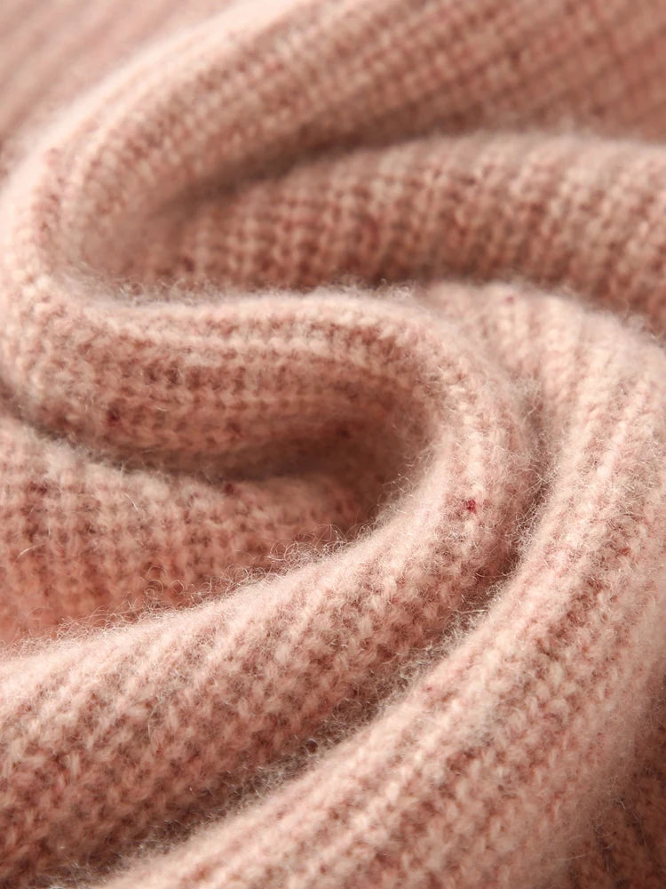Delicate Bloom Fisherman rib texture shown in wave-folded view, highlighting melange and stitch depth — From Borcelleclothes.