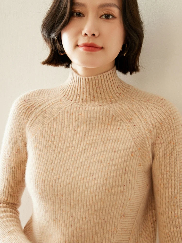 Upper section of the Spiced Latte Fisherman rib sweater, showing sculpted raglan seams and mock neck — From Borcelleclothes.