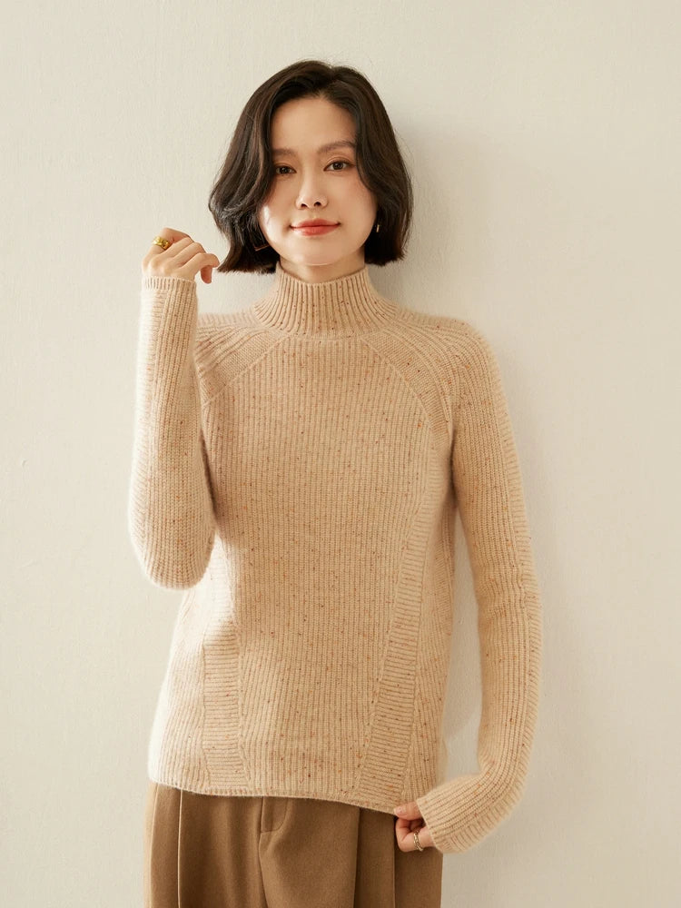 Women's Slim-fitting Fisherman rib cashmere sweater in Spiced Latte color, with sculptural raglan lines, mock neck, and diagonal purl panels — From Borcelleclothes.