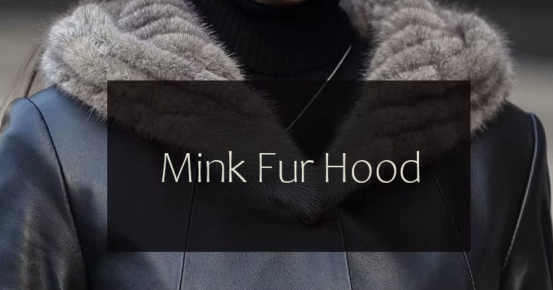 Women's Flared Hooded Coat in Onyx. Close-up demonstration of the genuine mink fur hood, framing the face with soft luxury. Borcelleclothes.