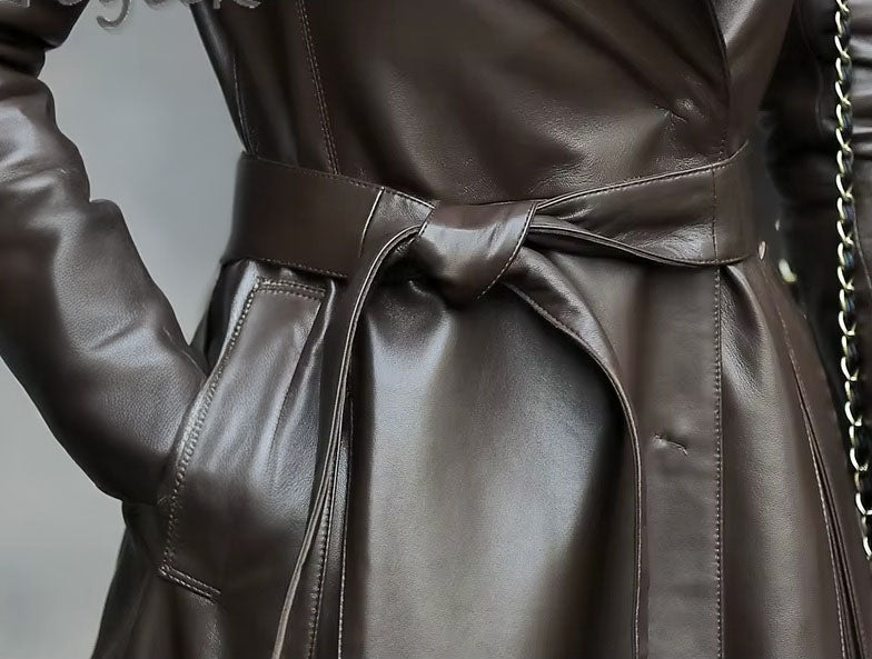 Women's Flowing Leather Coat in Taupe. Close-up of the waist, showcasing the self-tie leather belt that sculpts the silhouette with effortless elegance. Borcelleclothes.