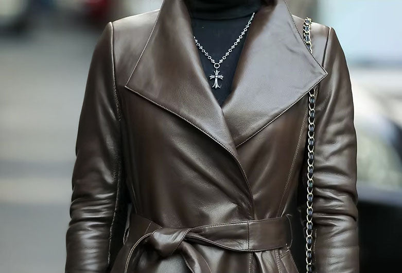 Women's Flowing Leather Coat in Taupe, styled without the fur collar for a sleek, sculptural look that highlights the refined neckline. Borcelleclothes.