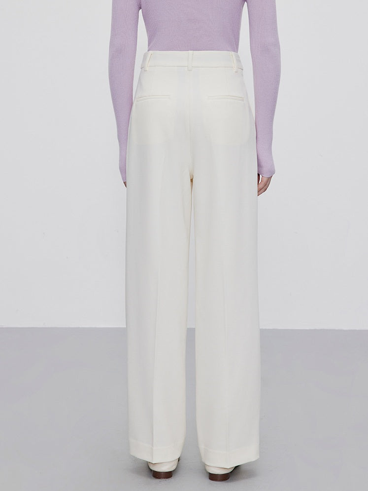 Back view of Platinum trousers showing fluid drape and subtle tailoring. From Borcelleclothes.