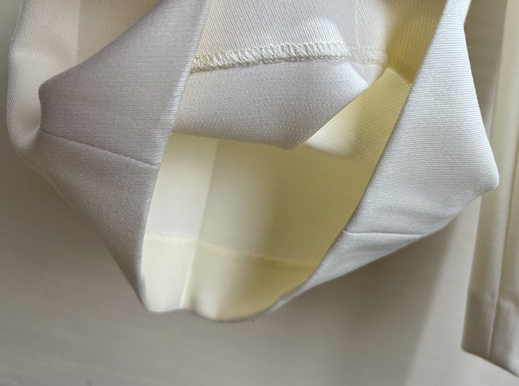 Inner hem of Platinum trousers turned up to display refined finish and fluid fabric. From Borcelleclothes.