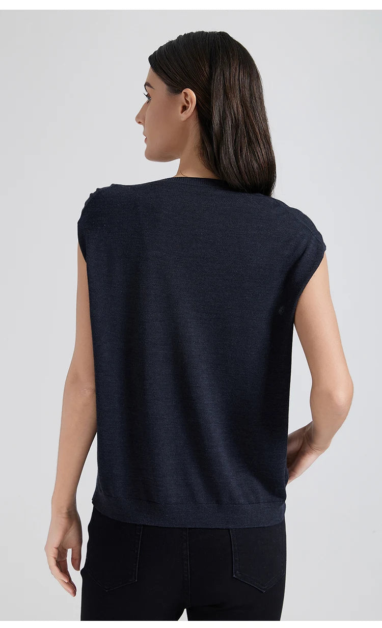 Back view of the Black Pearl top, displaying the fluid drape and ribbed trim. From Borcelleclothes.