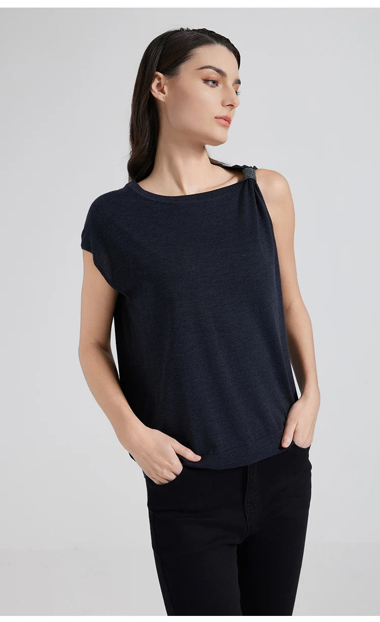 Model in Black Pearl top with both hands in pockets, emphasizing balance between softness and structure. From Borcelleclothes.
