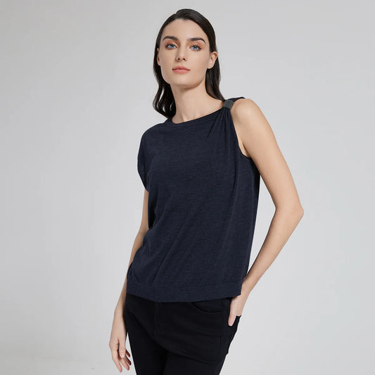 Model wearing gathered shoulder top in Black Pearl, turned slightly to the side to reveal gentle asymmetry. From Borcelleclothes.