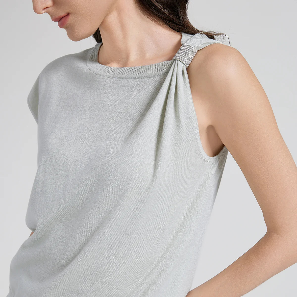 Close-up of the Geyser-colored top, highlighting the gathered shoulder and merino–silk texture. From Borcelleclothes.