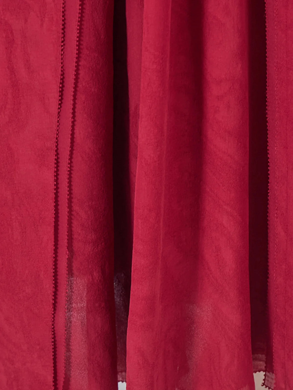 Close look at the lower skirt showcasing the hidden draping beneath the double overlay. From Borcelleclothes.