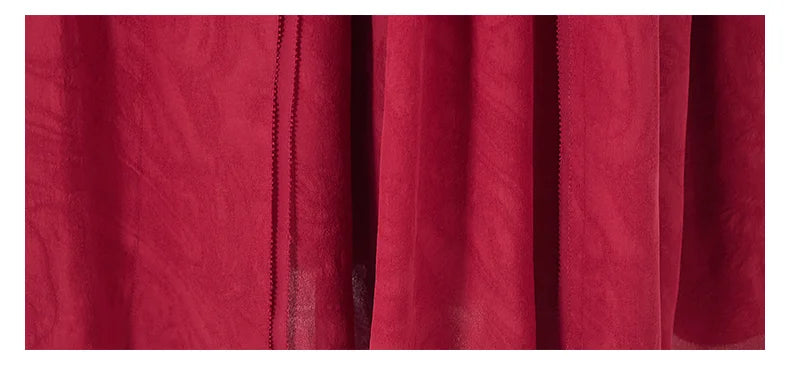 Jacquard silk fabric gently layered over georgette, capturing the dress’s graceful drape. From Borcelleclothes.