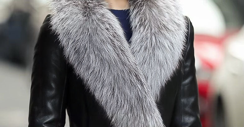Women's Goatskin Down Coat in Onyx. The detachable fox fur collar, adding warmth and opulence. Borcelleclothes.