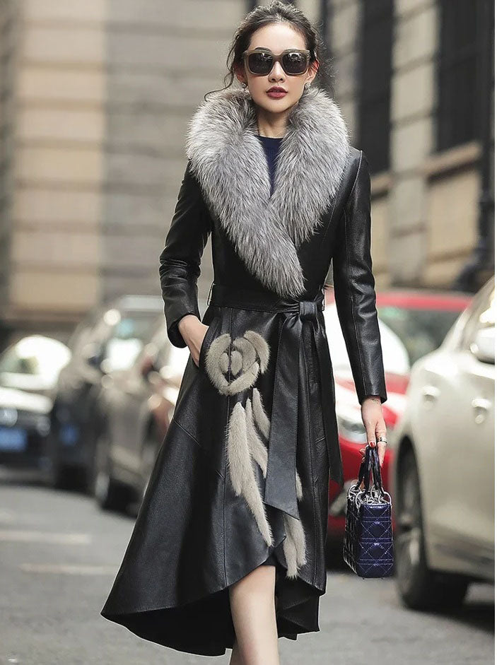 Women's Goatskin Down Coat in Onyx. Model places hand in patch pocket, emphasizing refined craftsmanship and luxurious detail. Borcelleclothes.