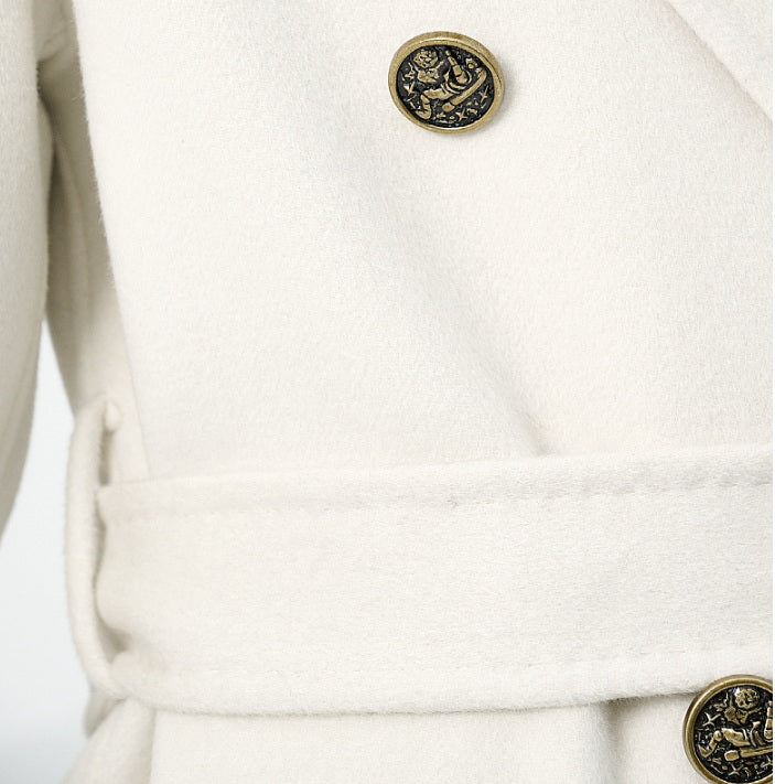The belt and loop detail on the Women's Grade A Cashmere Coat in Floral White, highlighting its structured silhouette and precise tailoring. From Borcelleclothes.