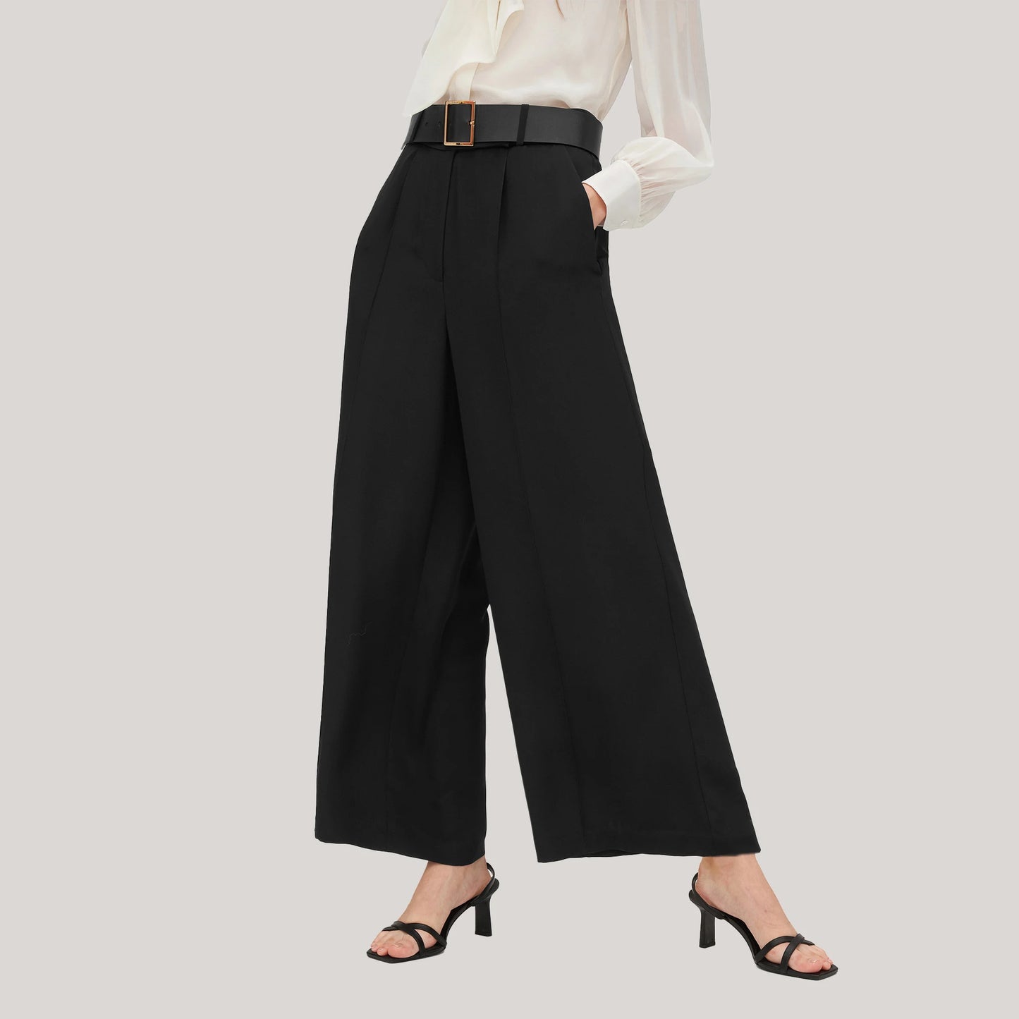 Women's wide-leg silk trousers in Onyx, made from heavy crepe. A structured silhouette that moves with gravity and grace. From Borcelleclothes.