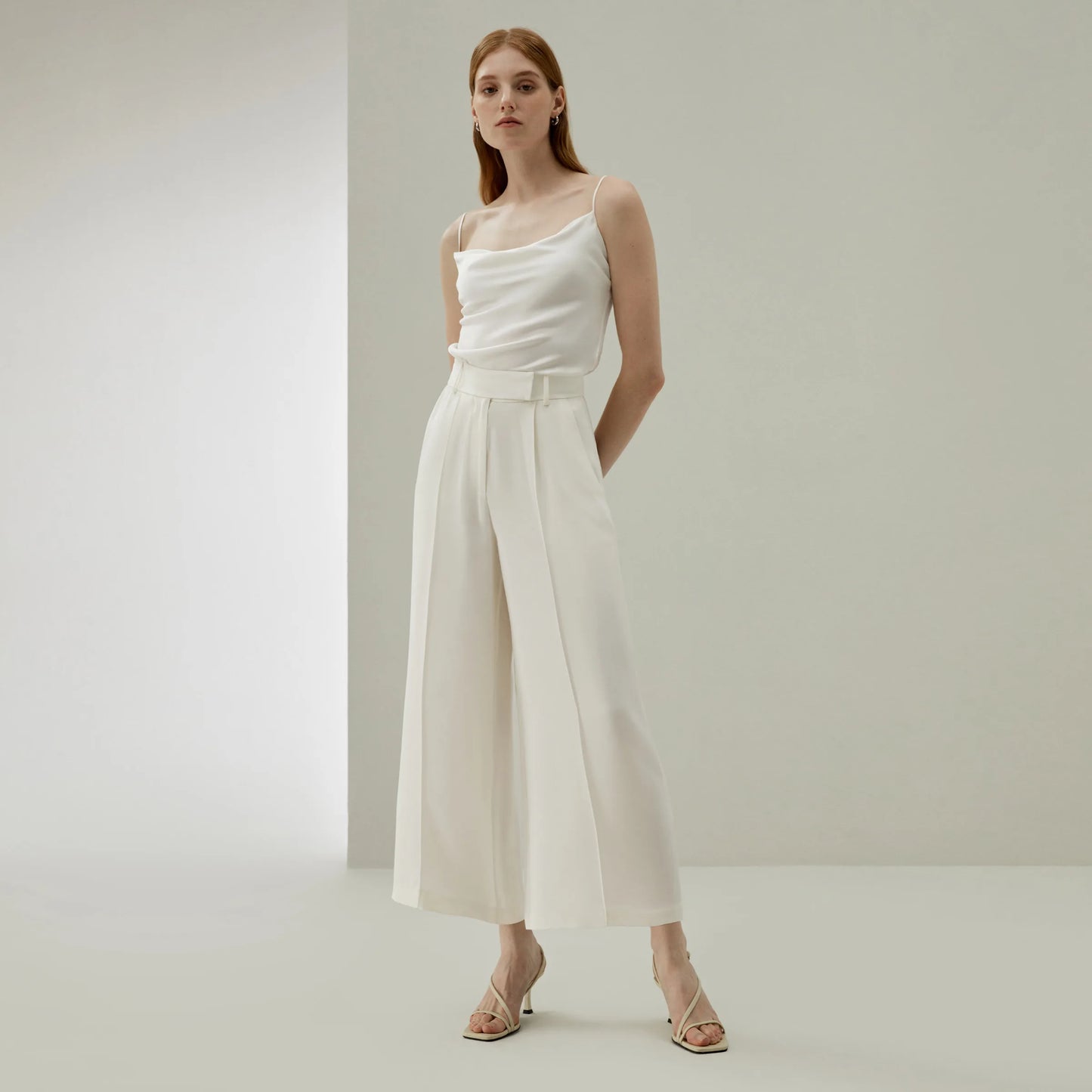 Women's wide-leg silk trousers in Pearl Bush, made from heavy crepe. A structured silhouette that moves with gravity and grace. From Borcelleclothes.
