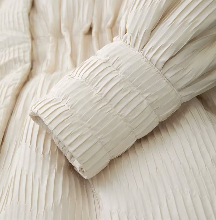 Cuff detail of the Pearl Bush jacquard down jacket. From Borcelleclothes.