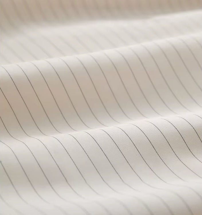 Striped inner fabric of the Pearl Bush jacquard down jacket. From Borcelleclothes.