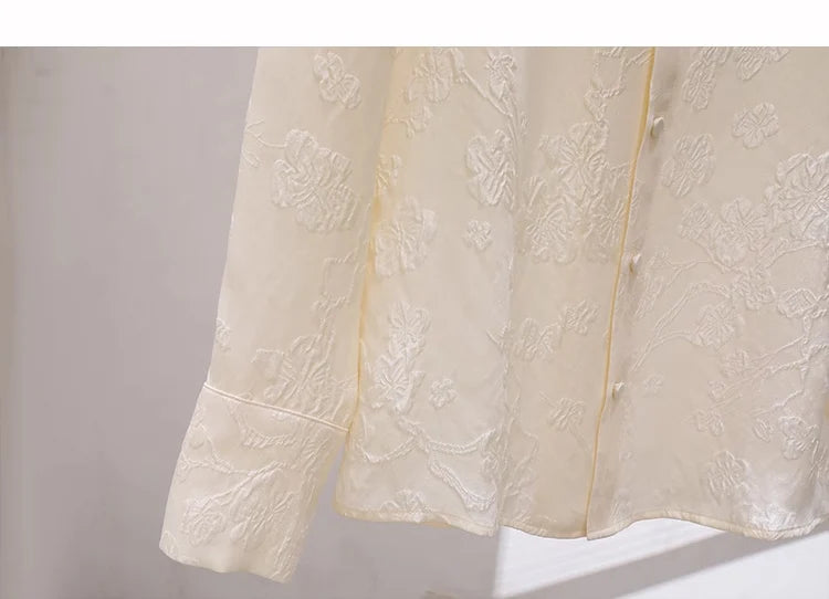 Bottom section of Pearl Bush jacquard silk blouse showing hem and texture. From Borcelleclothes.