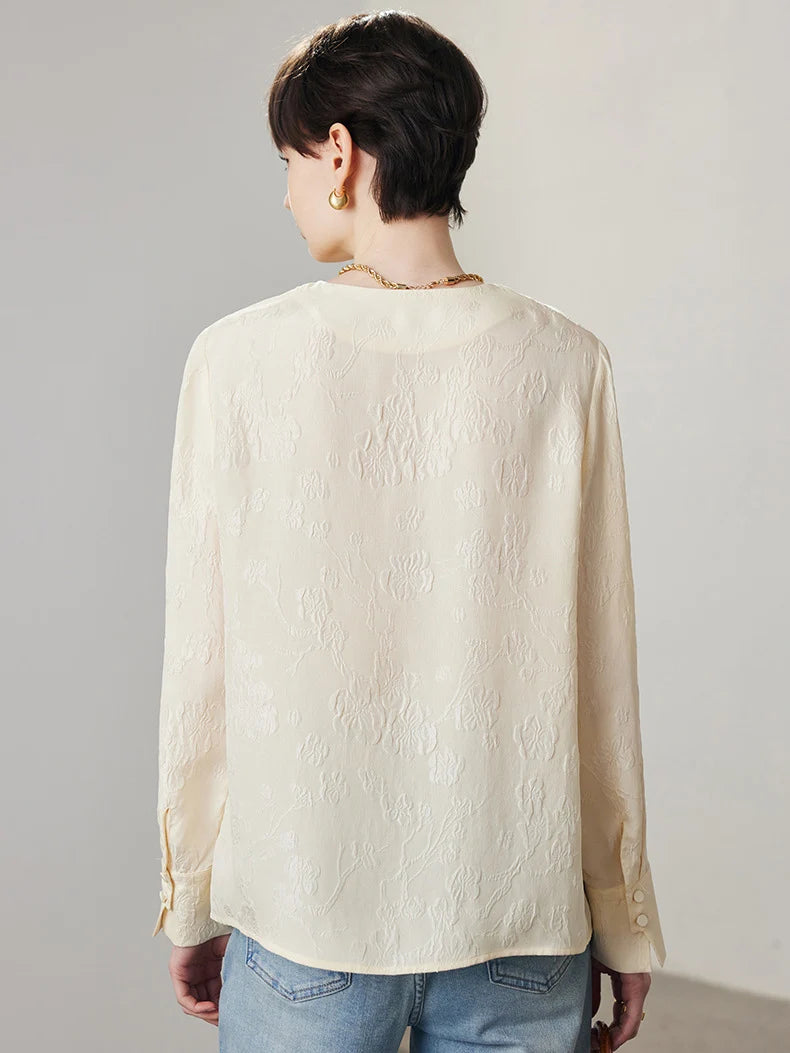 Back view of model wearing jacquard silk blouse in Pearl Bush. From Borcelleclothes.
