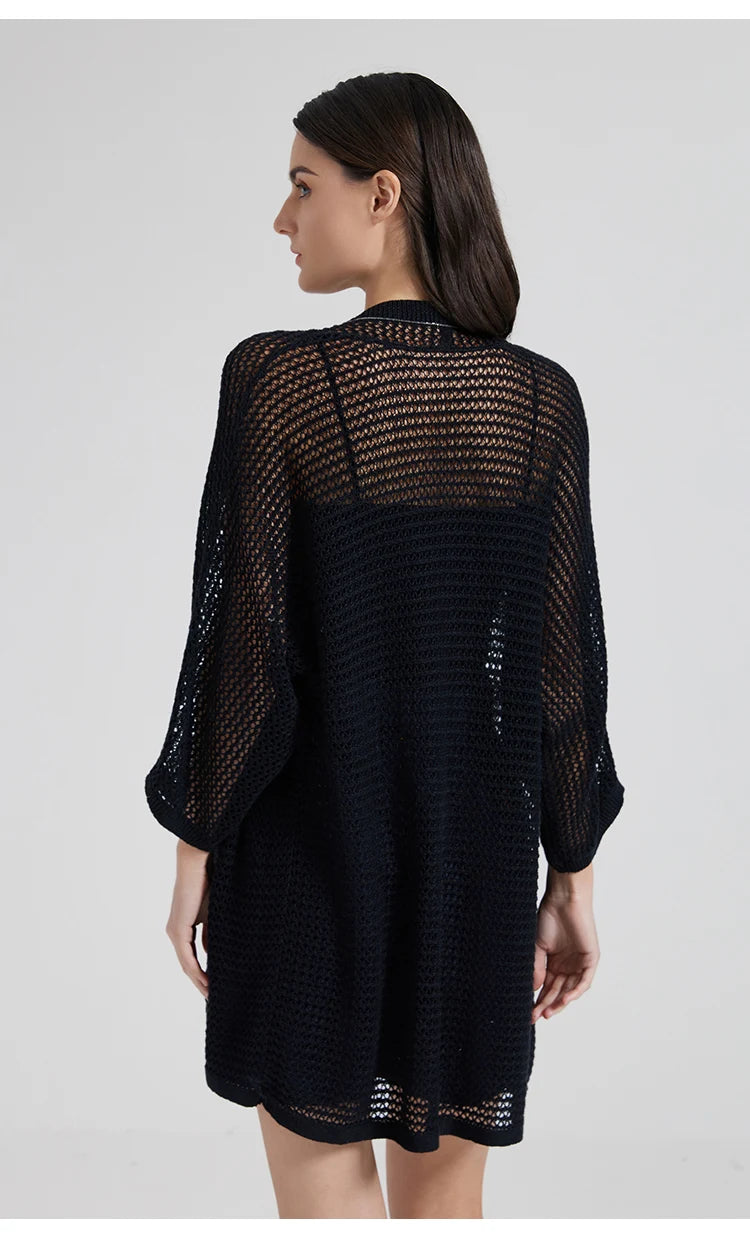 Back view of the Onyx overlay, displaying the see-through texture and graceful drape. From Borcelleclothes.