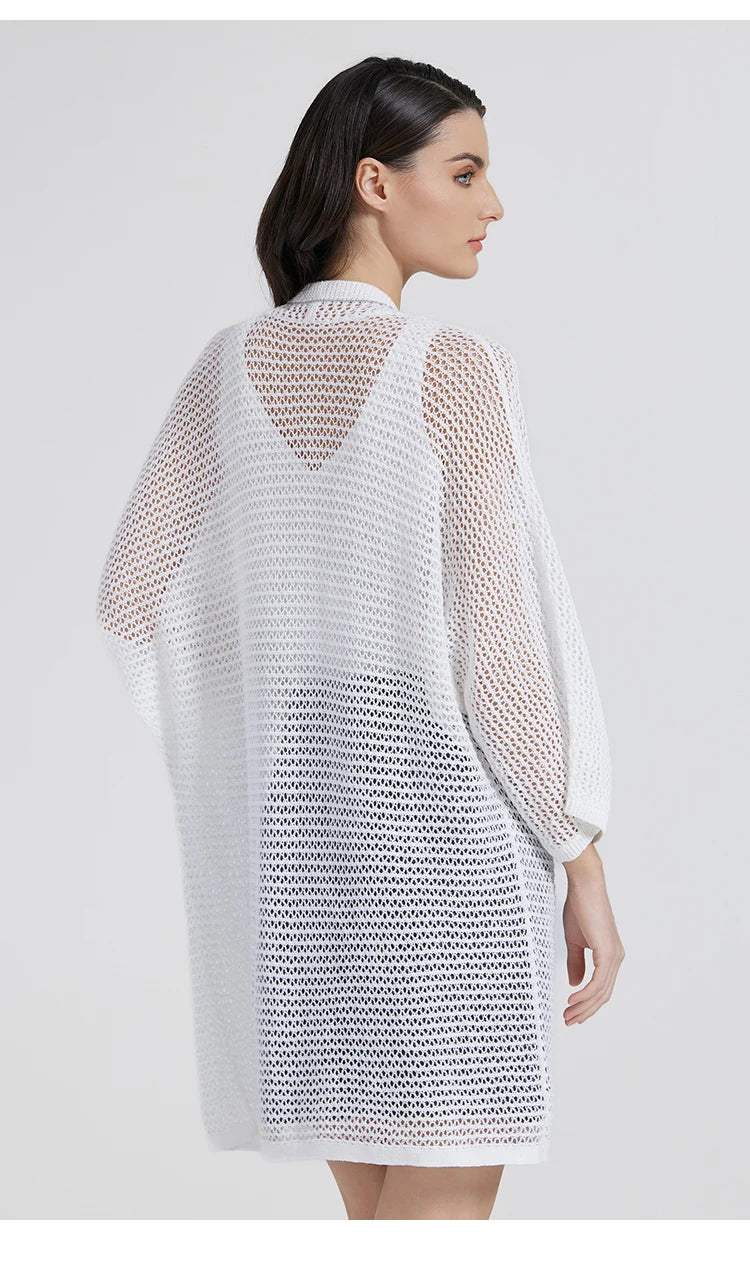 Back view of the White Lilac kimono-style overlay, showing the flowing silhouette and open knit pattern. From Borcelleclothes.