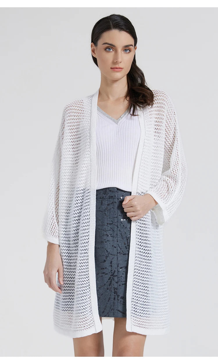 Model in White Lilac overlay with one arm bent, emphasizing the fluid movement of the fabric. From Borcelleclothes.