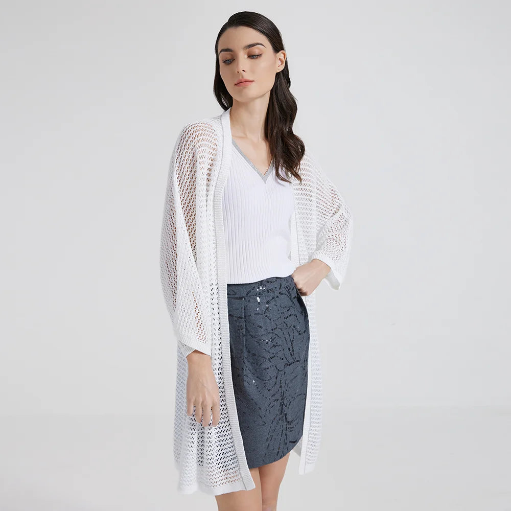 Model in White Lilac lace overlay with one hand resting gently at the waist, revealing the soft drape. From Borcelleclothes.