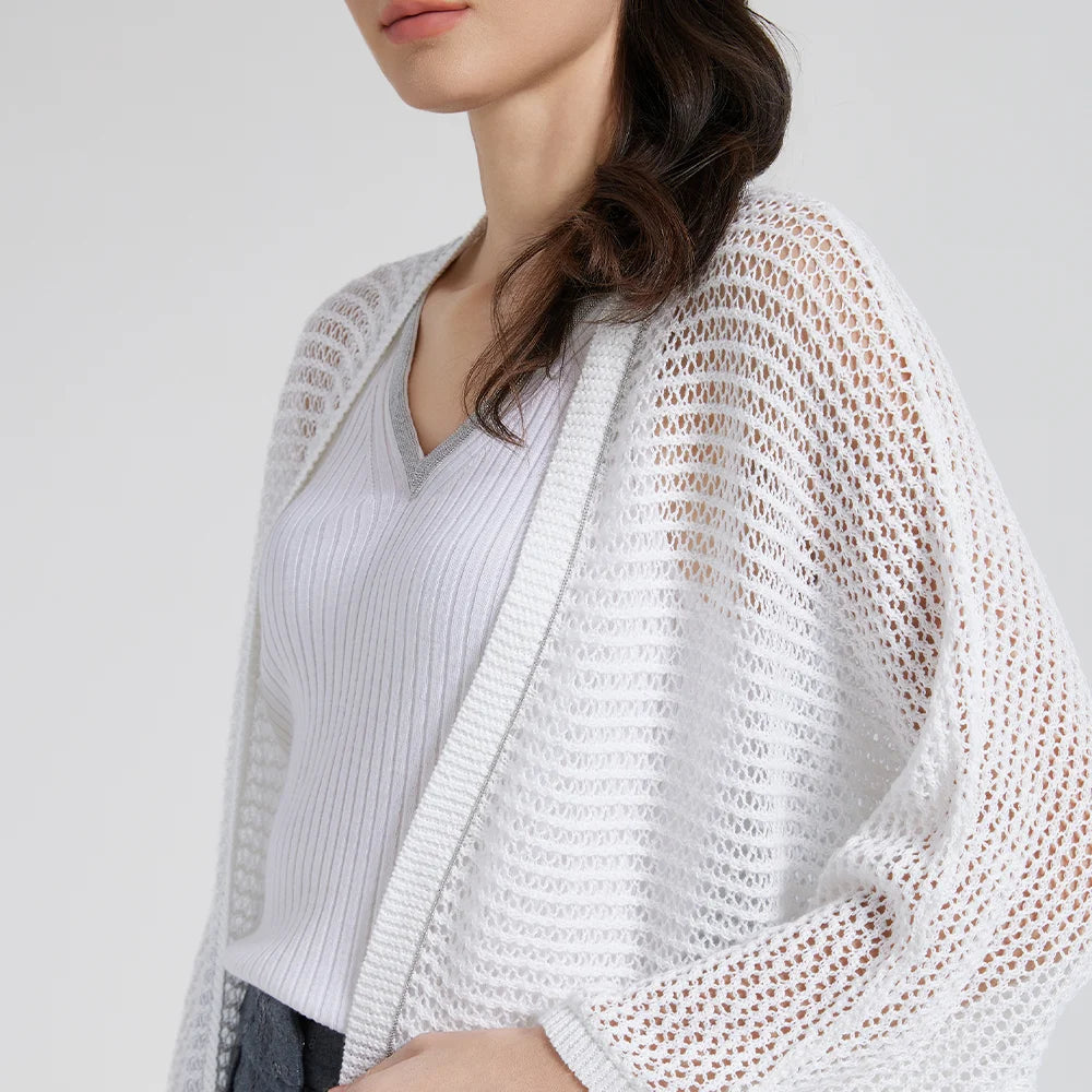 Upper view of the White Lilac lace overlay, showing the delicate net knit and airy neckline. From Borcelleclothes.