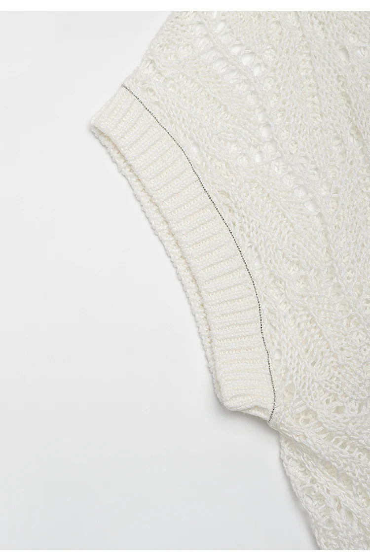Detailed view of armhole construction on Whisper top, showing ribbed edge and refined shaping of the batwing sleeve. From Borcelleclothes.