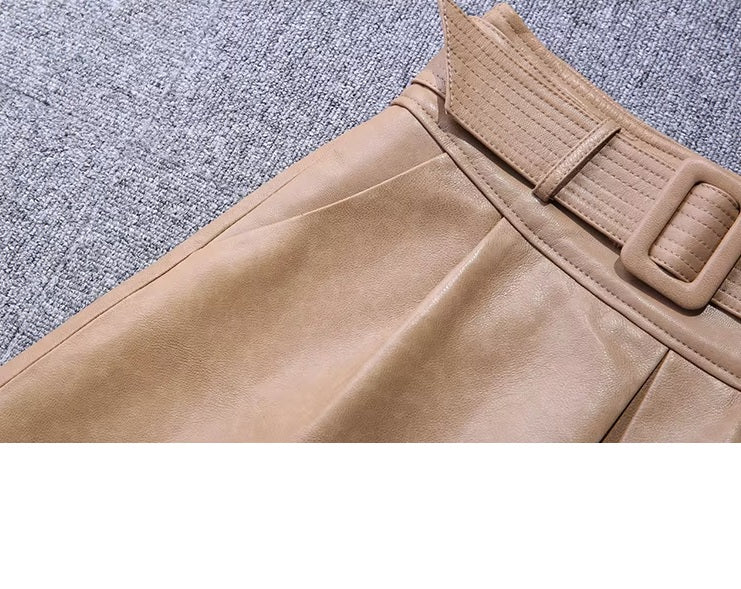 Women's Leather Midi Skirt in French Beige. Side slash pocket detail, seamlessly integrated for a refined and functional design. Borcelleclothes.