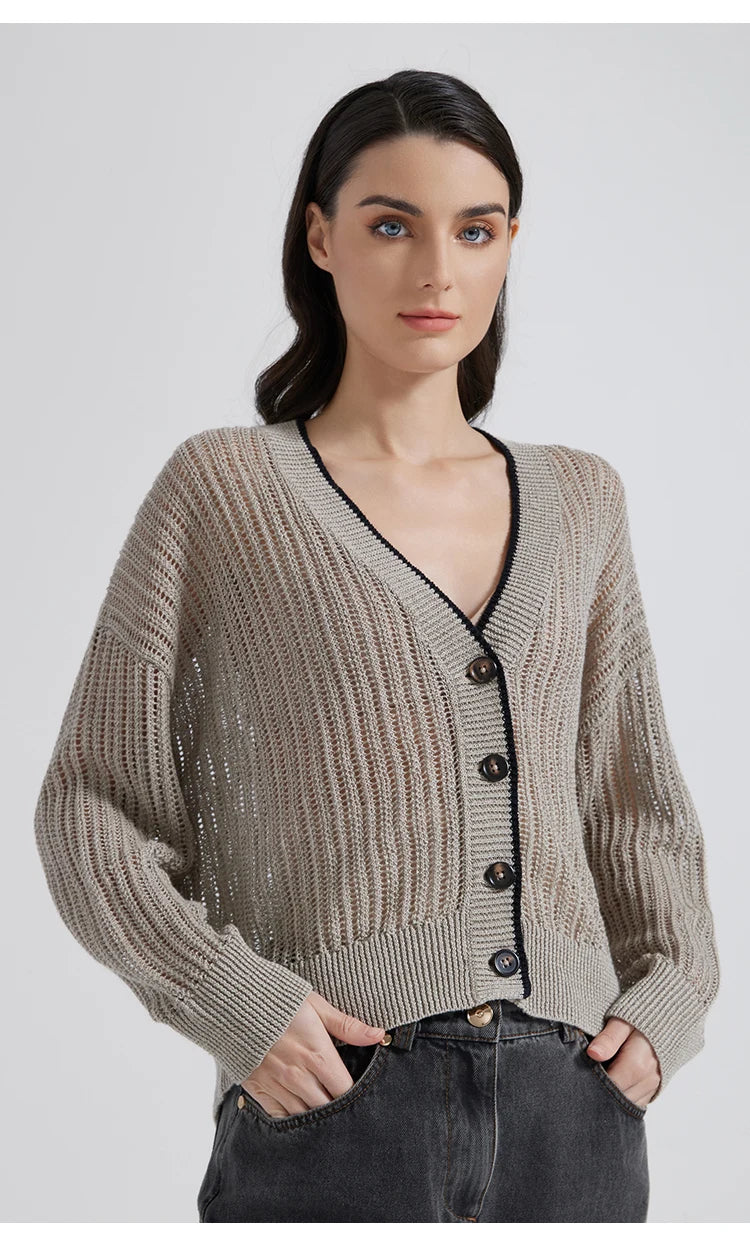 Model wearing Tide cardigan with both hands in pants pockets, revealing dropped shoulders and soft front drape. From Borcelleclothes.