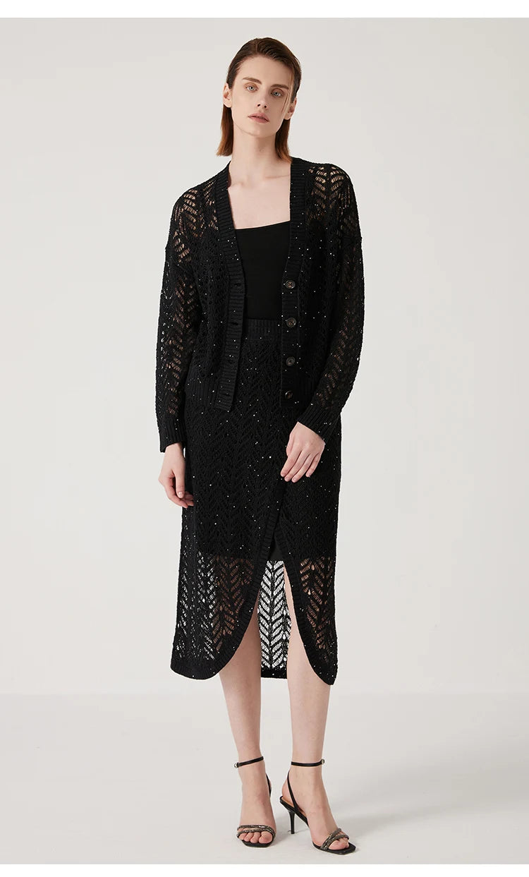 Model wearing the Onyx linen lace cardigan paired with a matching lace skirt. From Borcelleclothes.