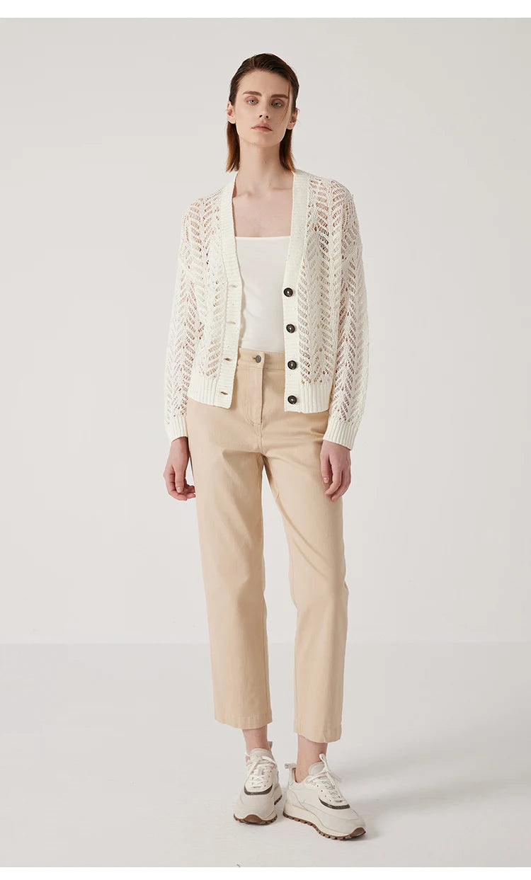 Pearl Bush cardigan worn with one knee bent, adding movement and flow to the airy silhouette. From Borcelleclothes.