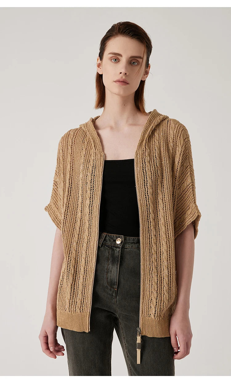 Woman wearing a mocha linen lace hoodie with arms relaxed straight down, highlighting the hoodie’s vertical lace pattern and front zipper. From Borcelleclothes.