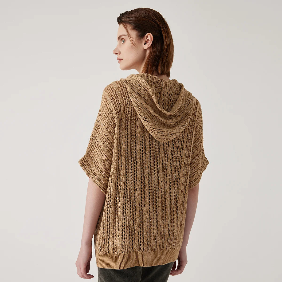 Back view of the mocha linen lace hoodie, showing the hood's drape and intricate openwork pattern. From Borcelleclothes.