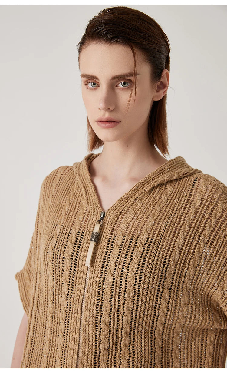 Close-up of the upper part of the mocha linen lace hoodie, showing braided stitches and the relaxed hood. From Borcelleclothes.