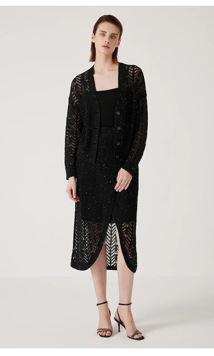 Model in full-length view - in the Onyx linen lace skirt, showcasing the ankle-length silhouette and light-diffusing pattern. From Borcelleclothes