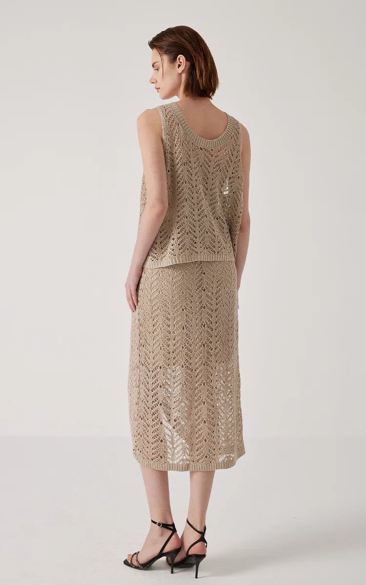 Straight back view of the Vanilla linen lace skirt, showing how the fabric falls and catches the light. From Bocelleclothes.