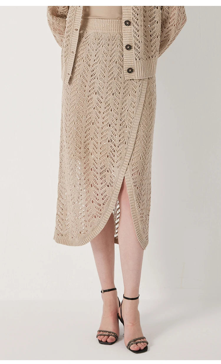 Back view of the Vanilla linen lace skirt with model’s hands behind, emphasizing the silhouette. From Borcelleclothes.