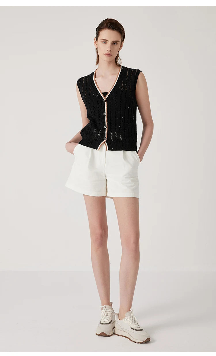 Full-length view of Onyx lace vest, structured silhouette with vertical pattern and ribbed hem in linen. From Borcelleclothes.