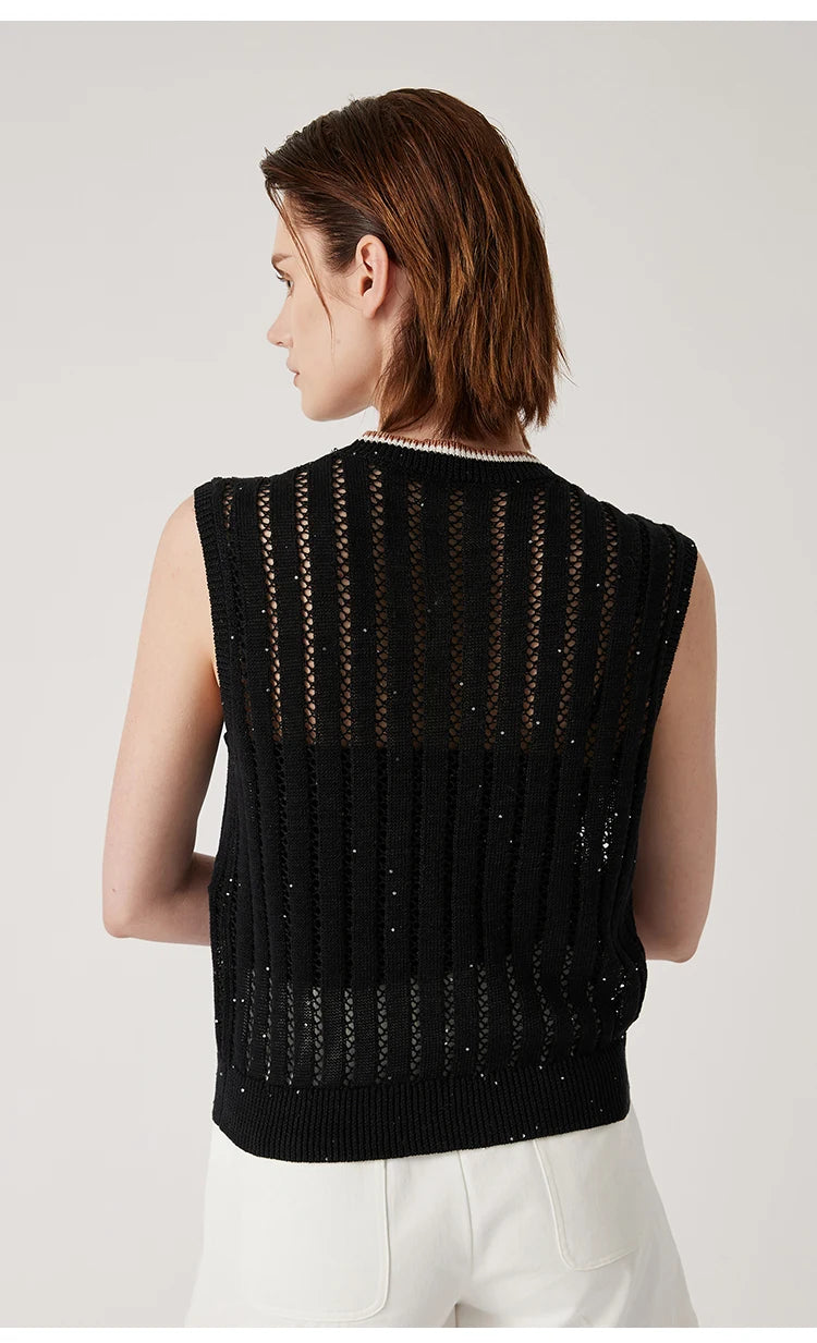 Back view of Onyx linen vest, showing alternating stockinette and lace panels and precise sleeveless cut. From Borcelleclothes.