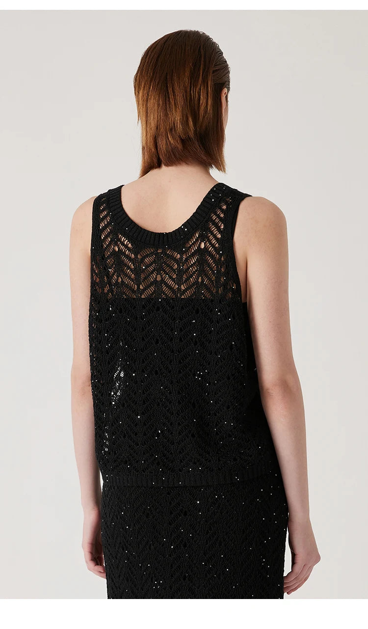 Back view of the Onyx linen top with its wide rib neckline and open knit. From Borcelleclothes.
