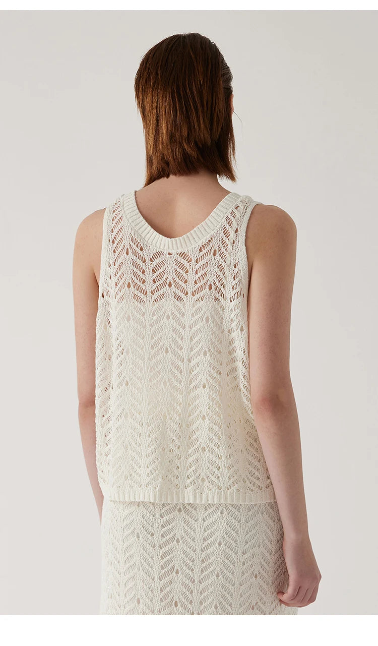 Back view of the Pearl Bush linen top highlighting the wide neckline and openwork pattern. From Borcelleclothes.