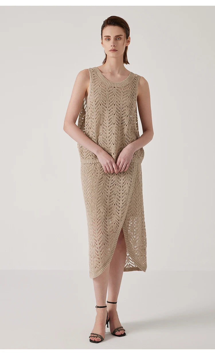 Model touching hands, showcasing the lightweight and festive feel of the Vanilla top. From Borcelleclothes.