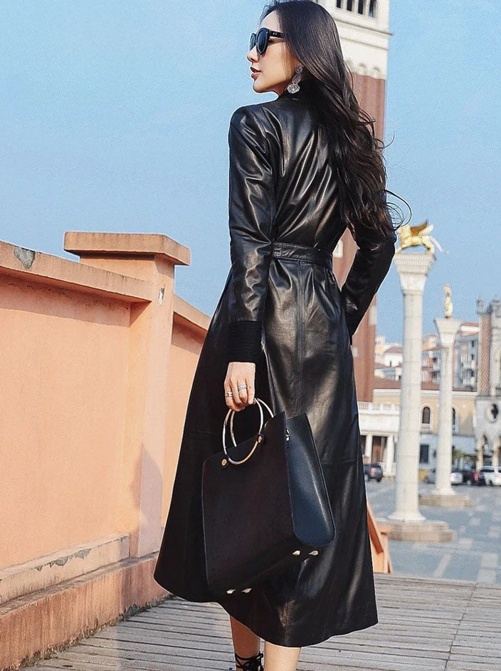 Women's Long Quilted Coat: Nightfall Embrace in Leather & Suede. Full back view displaying the structured paneling and fluid drape of the quilted design. Borcelleclothes.